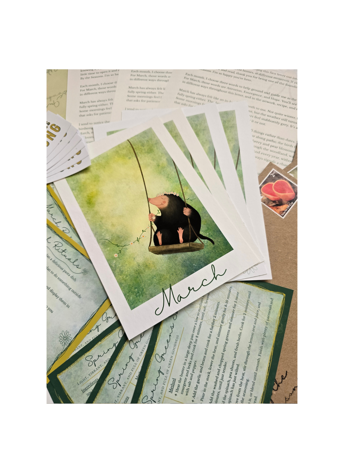 Card with illustration of a mole on a swing and text 'March' on a textured surface.
