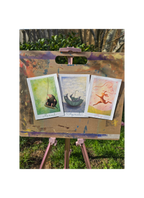 three art prints on an easel